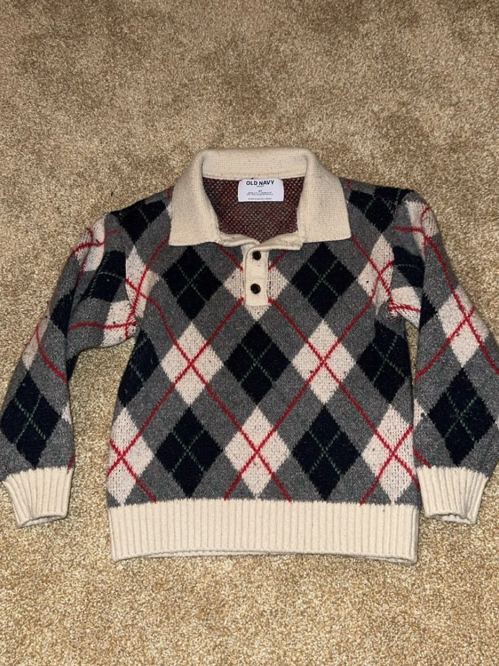 Old Navy kid’s Cream Argyle Zip-Neck Sweater with Black and Gray Diamonds